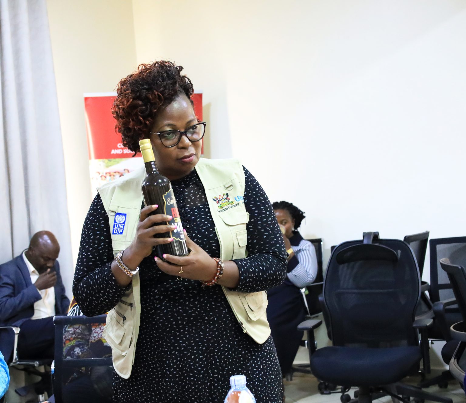 Dr. Margaret Nagwovuma, the Director of MUTIC showcasing one of the products produced by the center