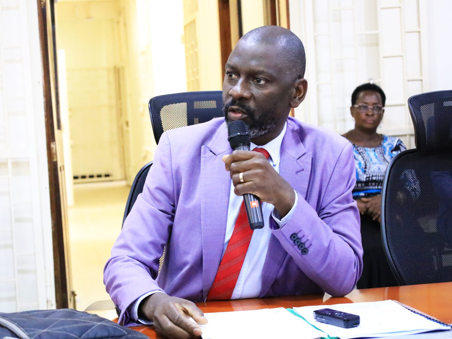 Prof. Kikooma giving remarks during the meeting